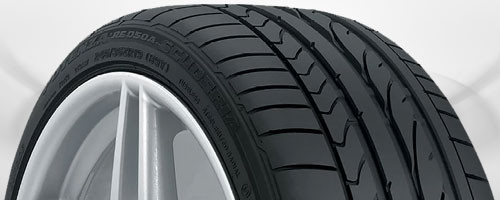 Ultra-high-performance tire with specialized tread blocks for extreme speed and handling capabilities
