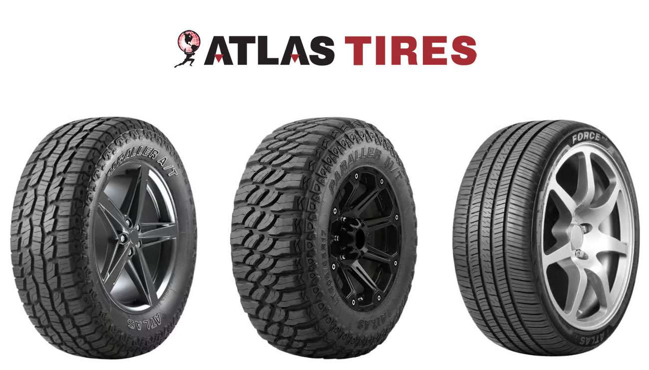 Atlas tire brand display showing various tire models and quality testing results