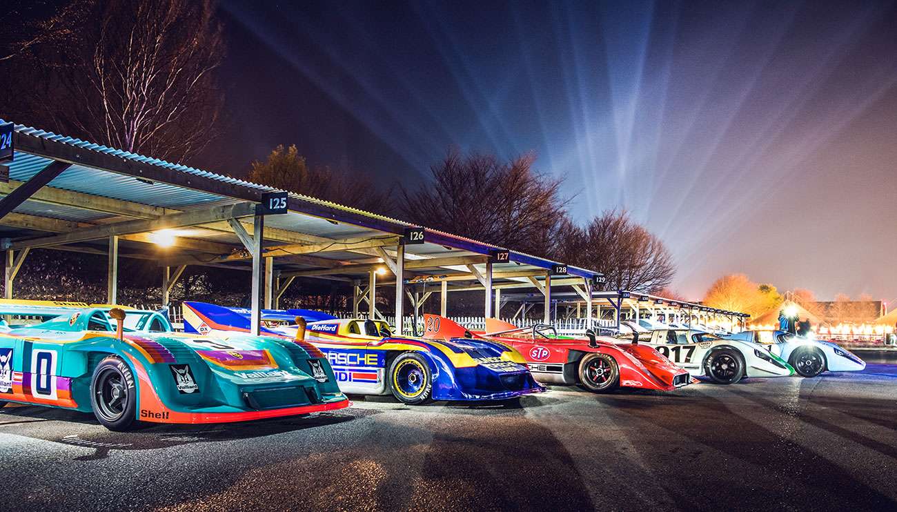 Close-up of Avon tire on wet road with sunset reflection, showcasing tire performance and tread design