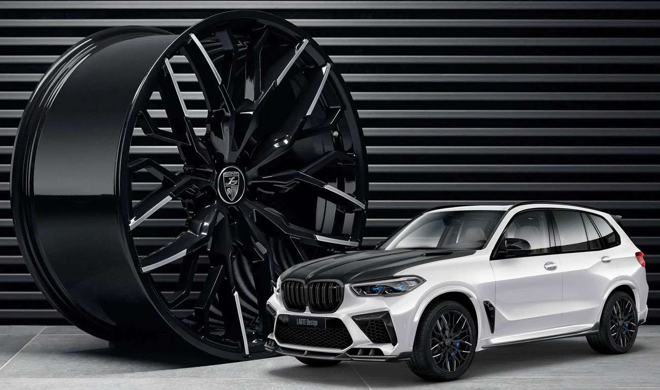 BMW X5M F95 with black forged wheels showcasing aggressive styling and premium automotive design