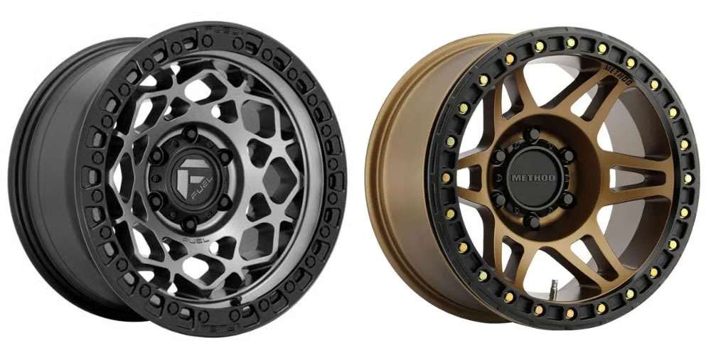 Close-up of Fuel Off-Road and Method Race Wheels showing manufacturer logos on rugged wheels.