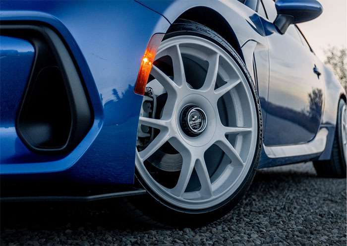 Fifteen52 rally-inspired wheel design on a neutral studio background