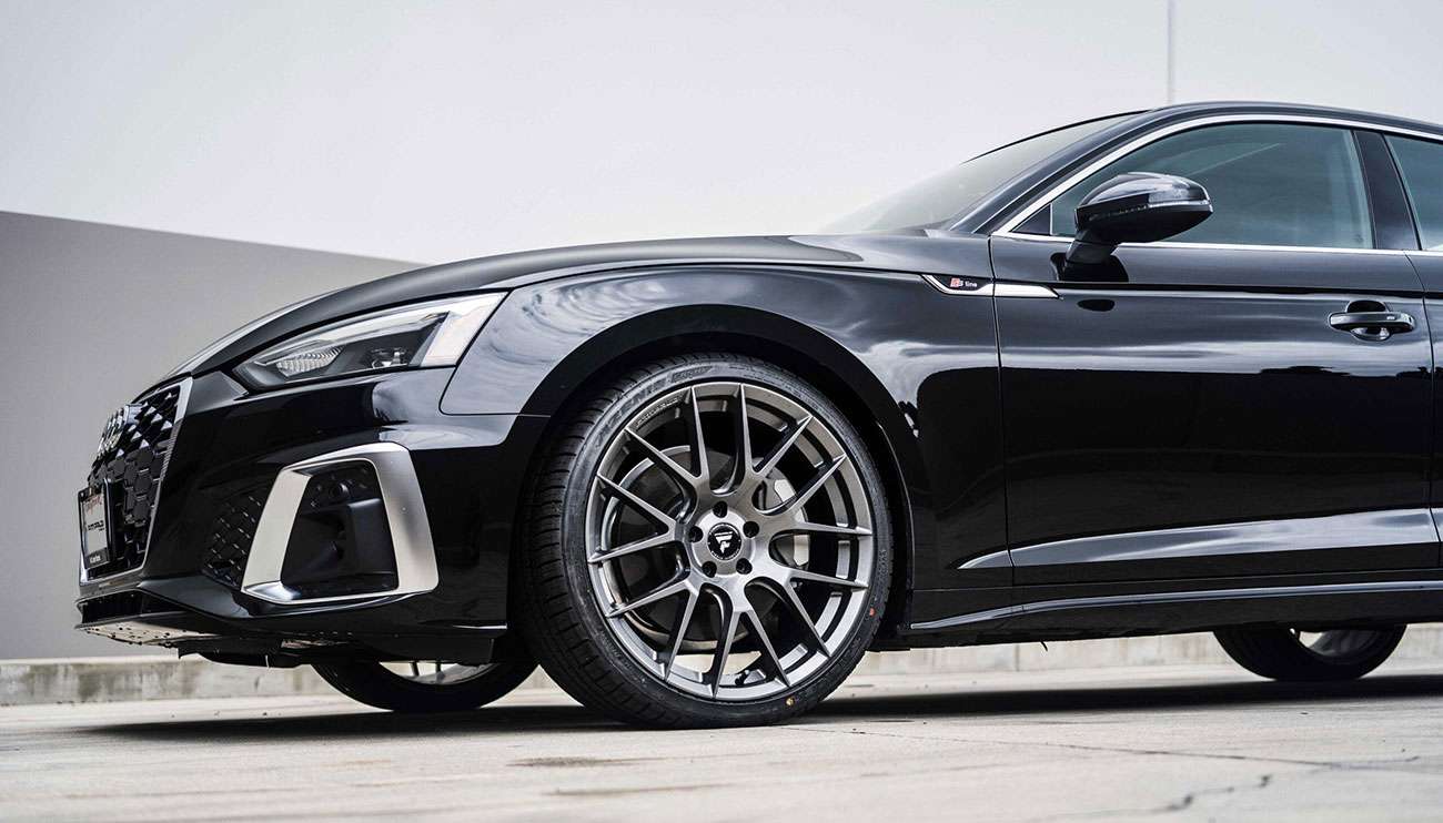 Fittipaldi performance wheels showcasing aggressive fitment and modern design
