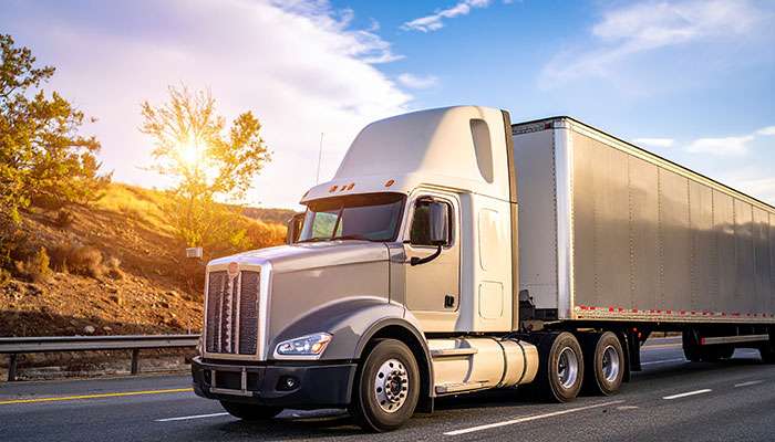 Highway truck tires on long-haul semi driving interstate