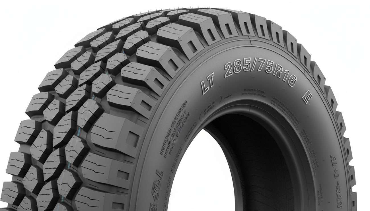 Light truck tire with LT designation on sidewall showing reinforced construction for heavy-duty applications