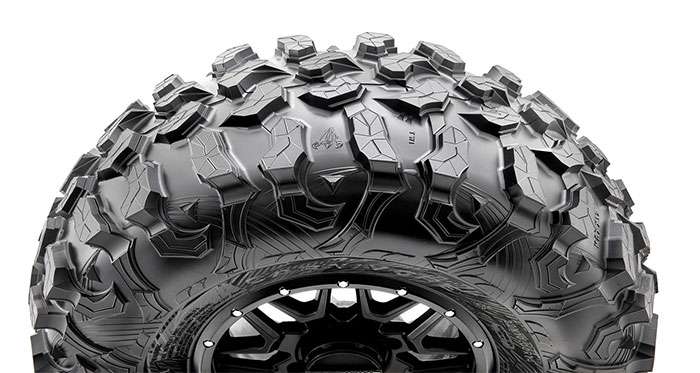 Maxxis ATV tires display showing various tire models and tread patterns