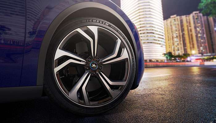 Michelin Pilot Sport EV tire showcased on an electric vehicle by Michelin North America.