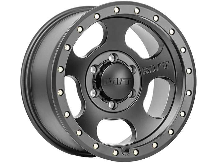 Matte black Mickey Thompson Canyon Pro wheel with five spokes and silver rivet accents