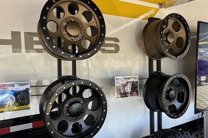 Mickey Thompson Classic and Canyon wheels in bronze and black finishes on display rack