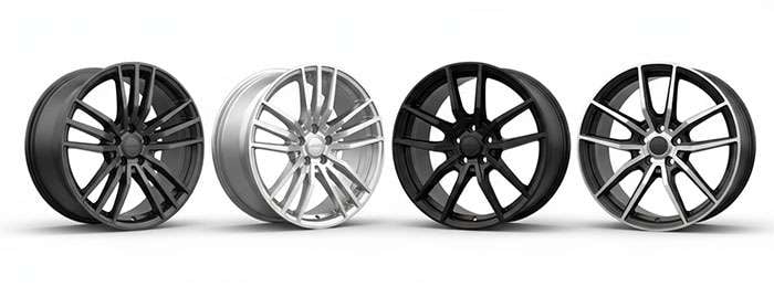 Selection of mid-range aluminum alloy wheels displaying various spoke designs and finishes