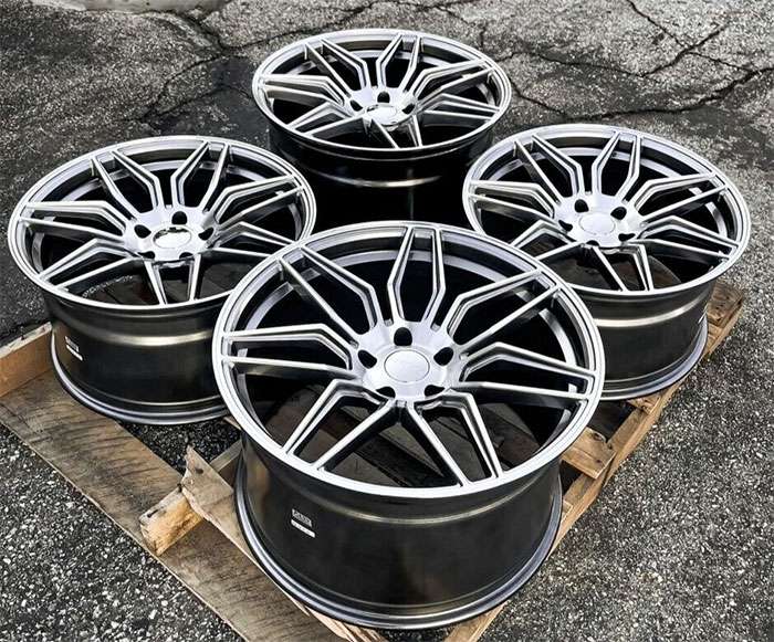Set of four 20 inch MRR M024 Flow Forge Chevy Camaro wheels with 5x120 bolt pattern and dual finish rims on wooden pallet