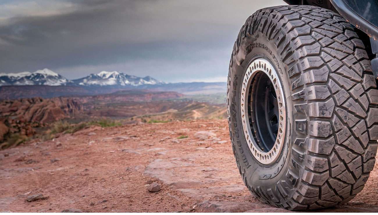 Performance-focused Nitto tires for trucks, SUVs, and sports cars on a clean white background