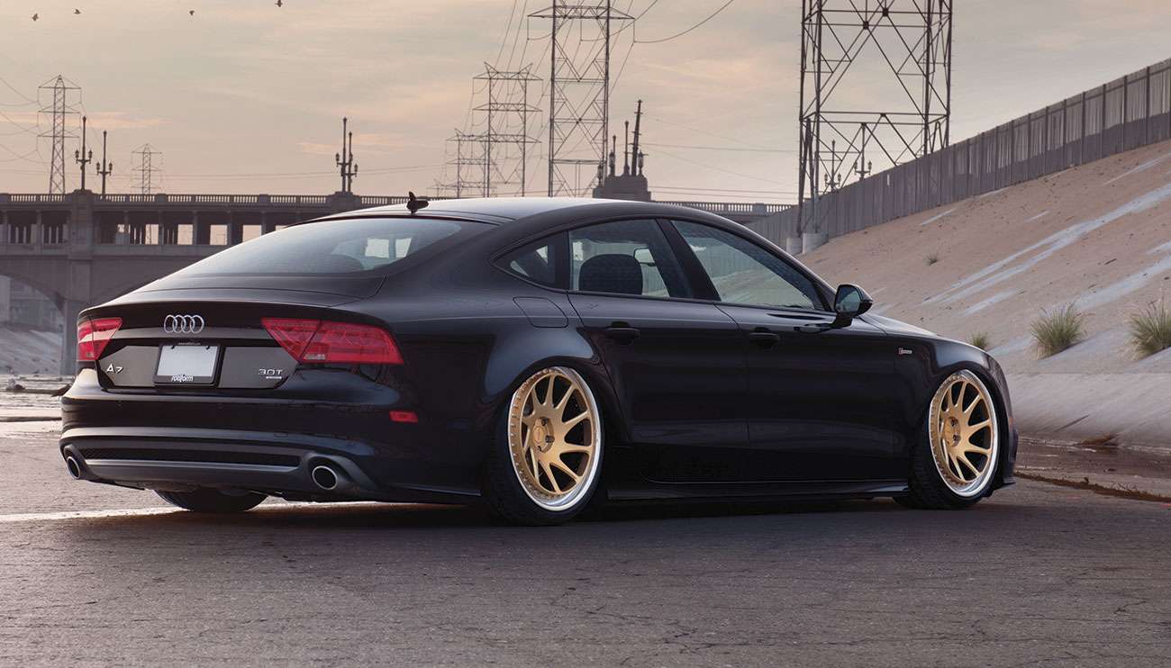 Close-up of two cars with Rotiform wheels highlighting street and track performance styles