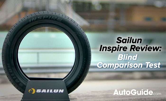 Sailun Inspire tire displayed with text announcing a blind comparison test review by AutoGuide.com.