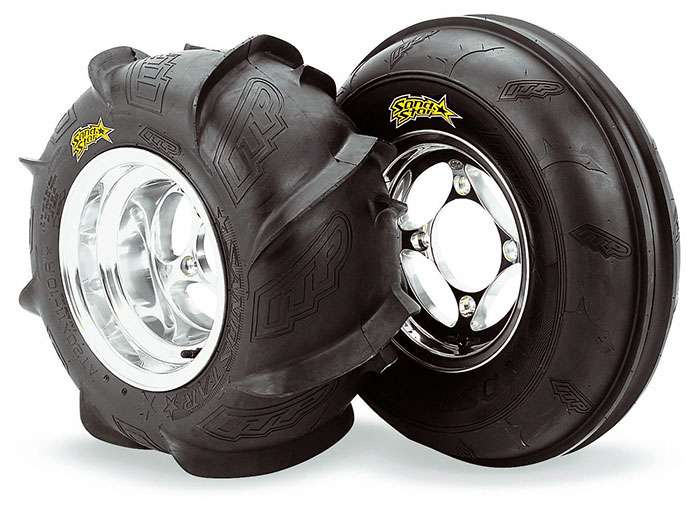 Specialized sand tire with wide footprint and paddle tread design for desert driving