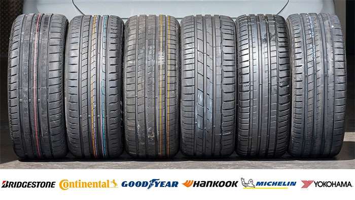 Six different tire brands Bridgestone, Continental, Goodyear, Hankook, Michelin, and Yokohama lined up for comparison.