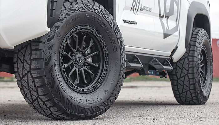 TIS Offroad wheels with deep-lip profiles and intricate machined spoke patterns