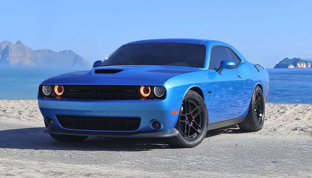 Voxx alloy wheels displayed on a Dodge Charger