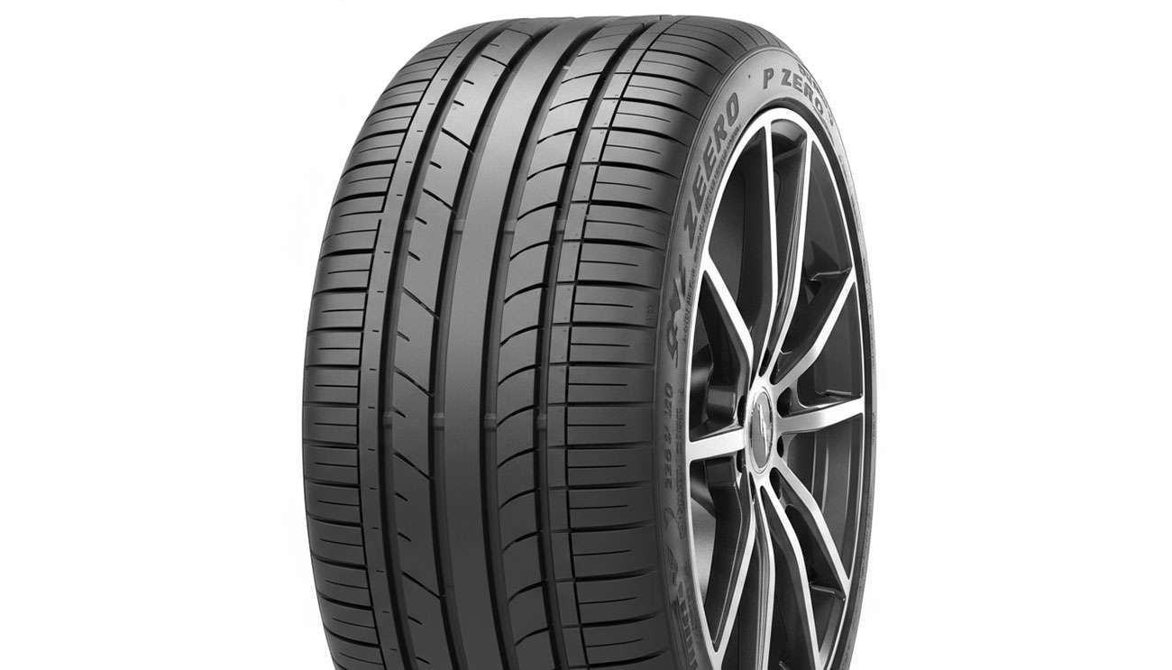 Close-up of a car's alloy wheel and tire showcasing tire tread and rim design for choosing the right fit